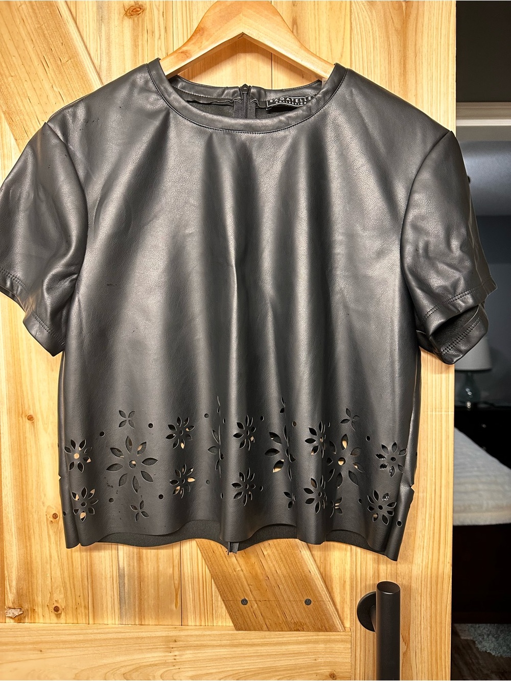 Bagatelle Vegan/Faux Leather Laser CutFloral Hem Top